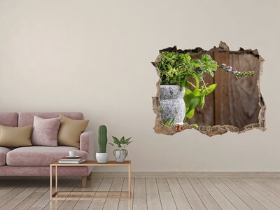 Autocollant mural trou Un jardin verdoyant dans un trou en béton