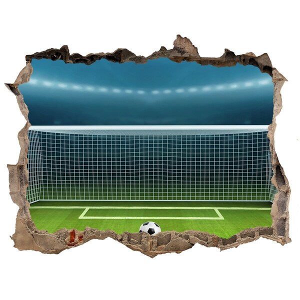Autocollant mural trou Le stade de football derrière le trou dans le mur