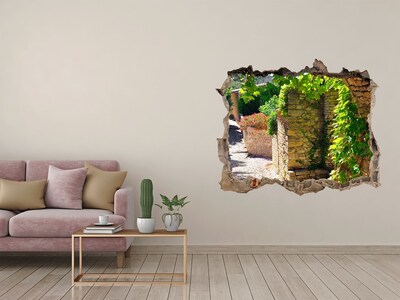 Sticker trou dans le mur Une rue verte dans la ville