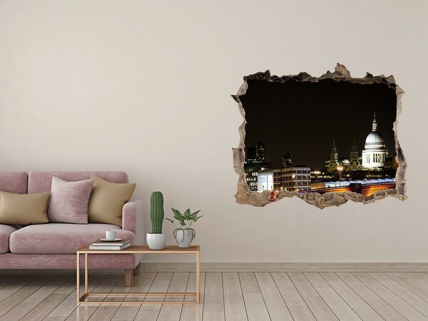 Sticker mural effet trou Vue nocturne de Londres à travers un trou dans le mur