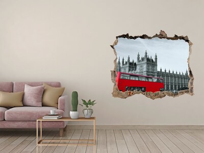 Sticker trou dans le mur Paysage londonien avec un bus rouge