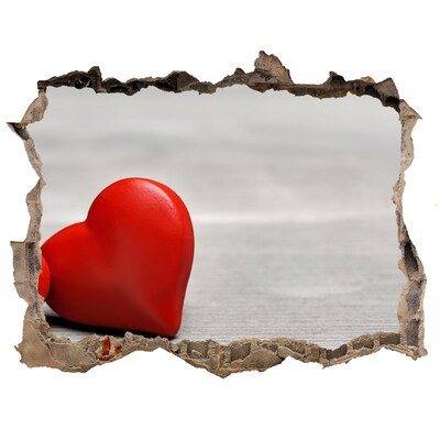 Sticker mural effet trou Un cœur dans un trou dans le mur