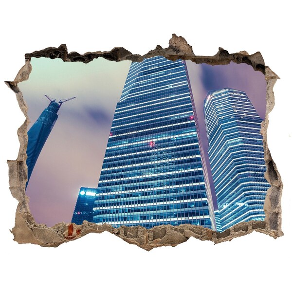 Autocollant mural trou Ville moderne à travers un trou dans le mur