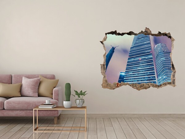 Autocollant mural trou Ville moderne à travers un trou dans le mur