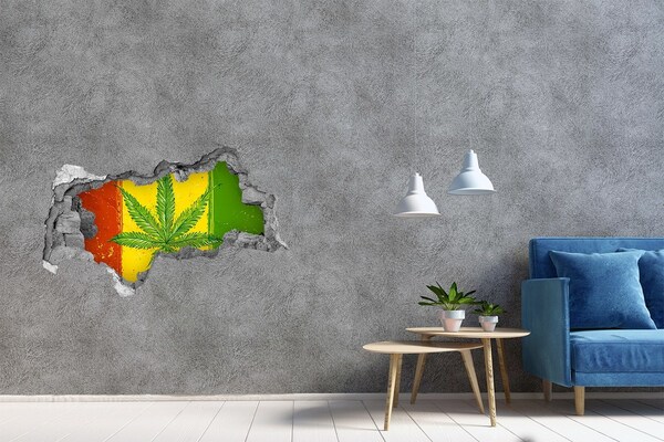 Sticker trou dans le mur Feuille de cannabis verte sur fond jaune-rouge-vert