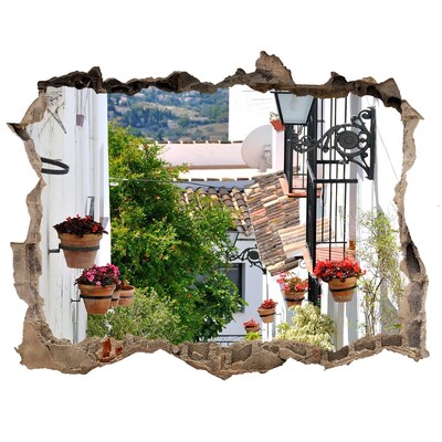 Sticker mural effet trou Une rue charmante dans un village blanc