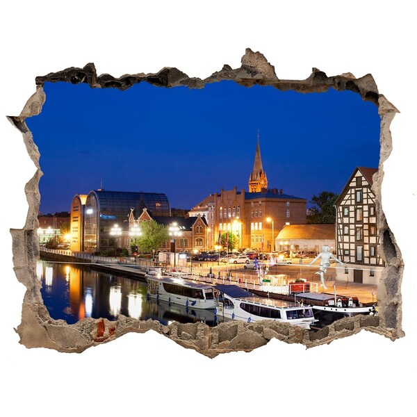 Sticker mural effet trou Vue nocturne de la ville au bord de la rivière