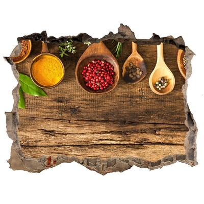 Sticker trou dans le mur Épices de cuisine sur un comptoir en bois