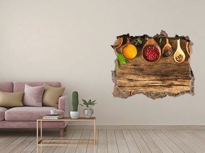 Sticker trou dans le mur Épices de cuisine sur un comptoir en bois