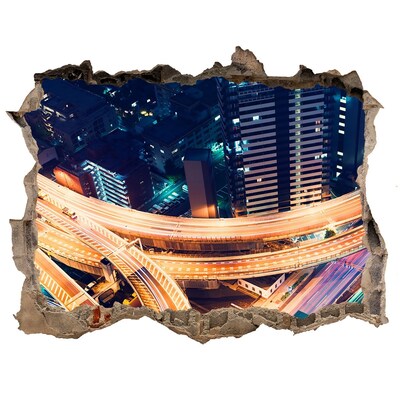 Sticker trou dans le mur Vue de la ville la nuit