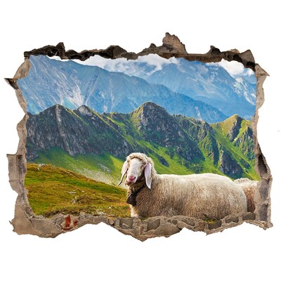 Sticker mural effet trou prairie de montagne avec des moutons