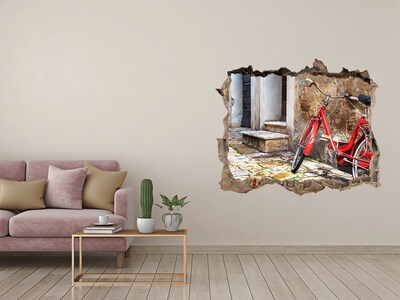 Autocollant à effet 3d trou Un vélo rouge dans une rue charmante