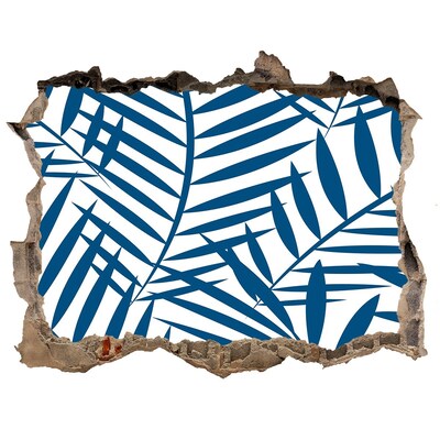 Sticker mural effet trou Des feuilles tropicales dans un trou dans le mur