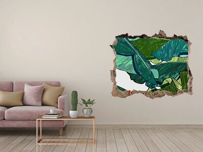 Sticker mural effet trou jardin tropical avec des feuilles de bananier