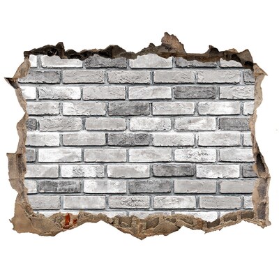 Sticker mural effet trou Un mur de briques en ruine