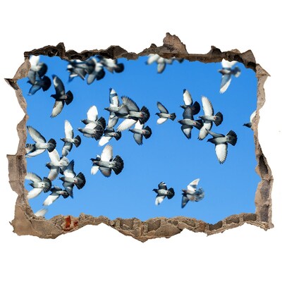 Sticker mural effet trou Des oiseaux volent à travers un trou dans le mur