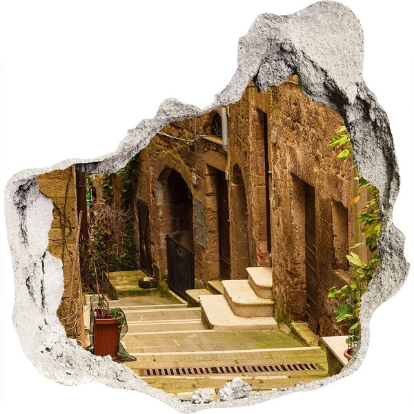 Sticker mural effet trou Une rue charmante de la ville