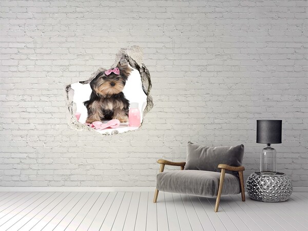 Sticker trou dans le mur Un adorable Yorkshire Terrier avec un nœud rose