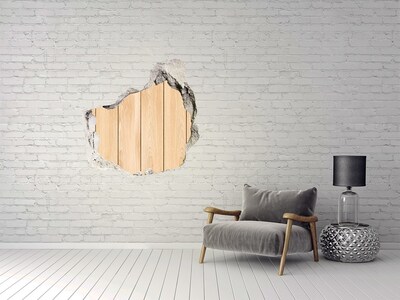 Sticker mural effet trou Un mur abîmé avec un plancher en bois