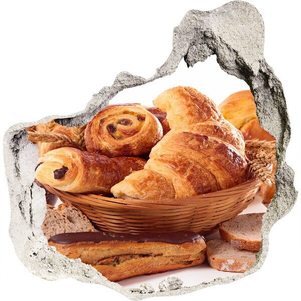 Sticker trou dans le mur De délicieuses pâtisseries dans un panier