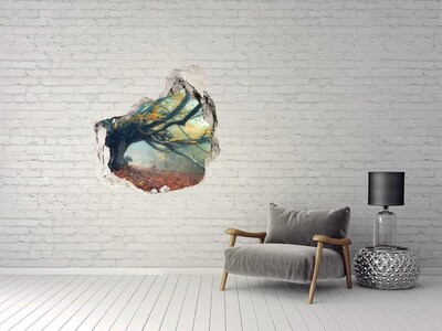 Sticker mural effet trou La forêt enchantée dans son manteau d'automne