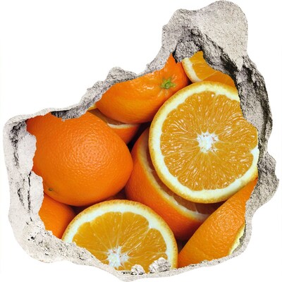Autocollant à effet 3d trou Des oranges fraîches dans un trou dans le mur