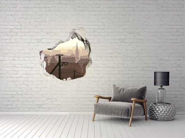 Sticker trou dans le mur Vue de la ville à travers un trou dans le mur
