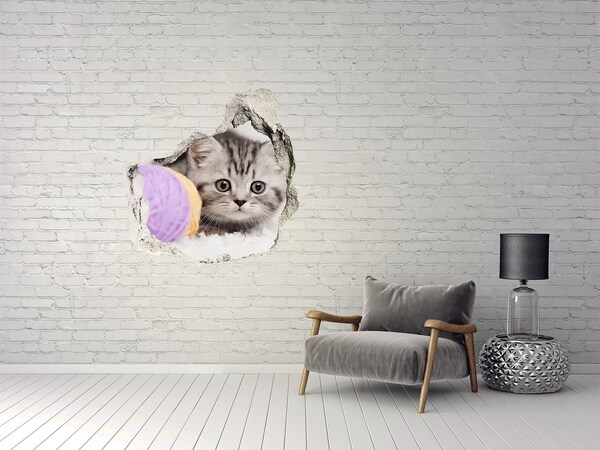 Autocollant mural trou Le chaton derrière le mur