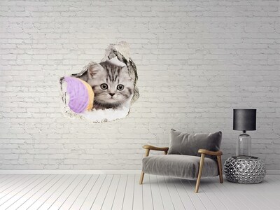 Autocollant mural trou Le chaton derrière le mur