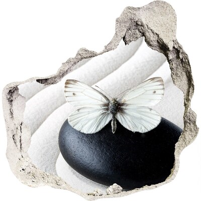 Autocollant mural trou Un papillon sur une pierre dans un cadre zen