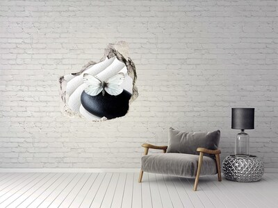 Autocollant mural trou Un papillon sur une pierre dans un cadre zen