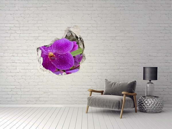 Autocollant à effet 3d trou Une orchidée dans un trou dans le mur
