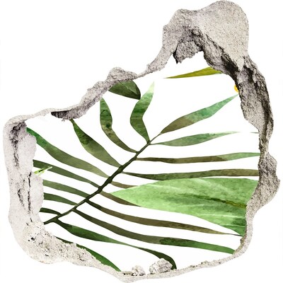 Sticker mural effet trou Un palmier vert à travers un trou dans le mur