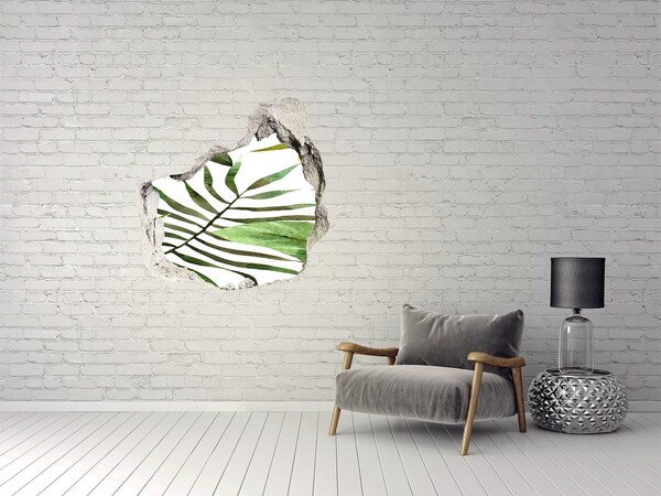 Sticker mural effet trou Un palmier vert à travers un trou dans le mur