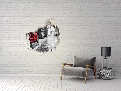 Sticker trou dans le mur Un vélo rouge dans une rue charmante