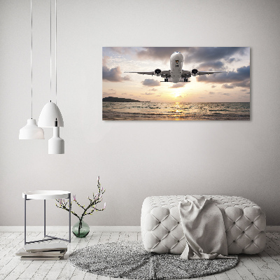 Tableau mural sur toile Avion au-dessus de la mer