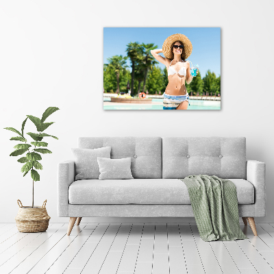 Tableau mural sur toile Femme au bord de la piscine