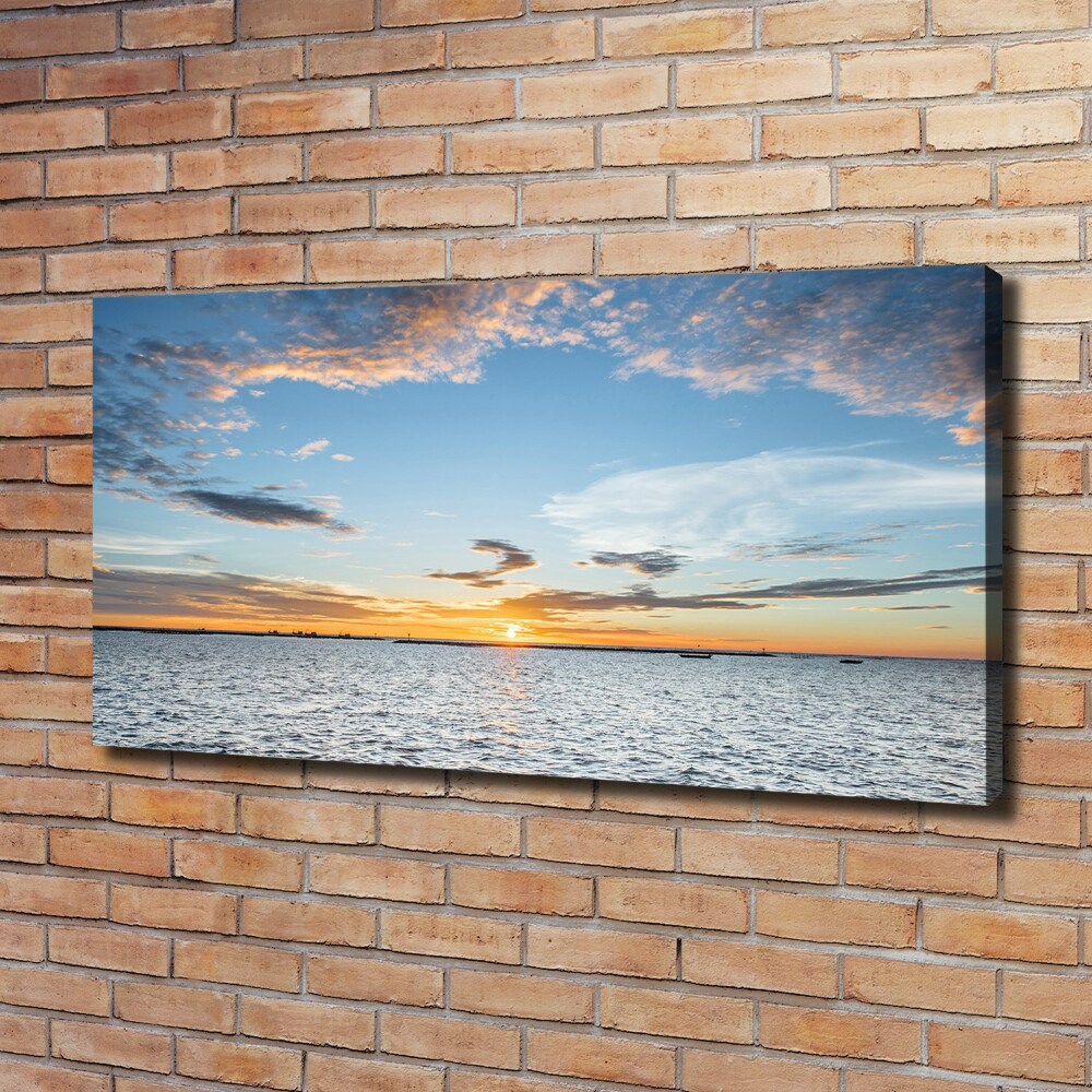 Tableau mural sur toile Crépuscule au bord de la mer