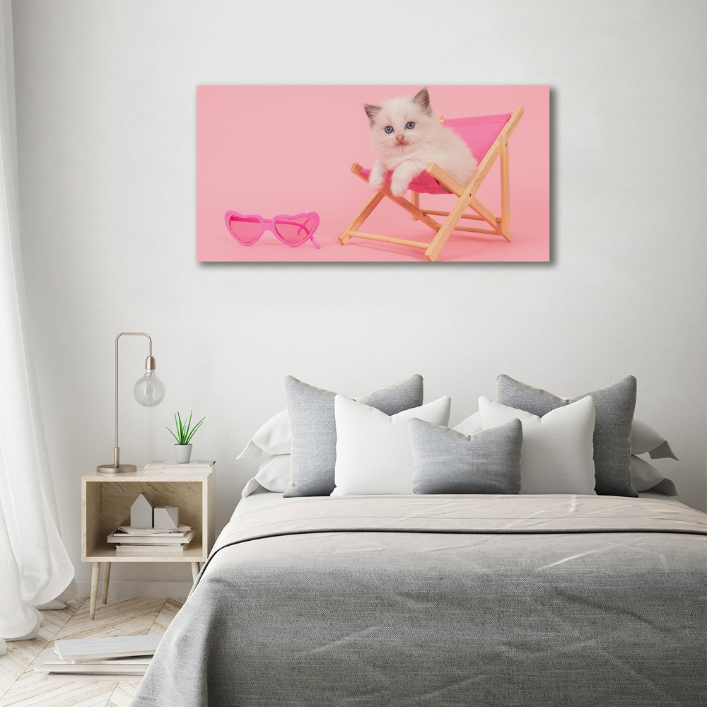 Tableau mural sur toile Chat sur une chaise longue