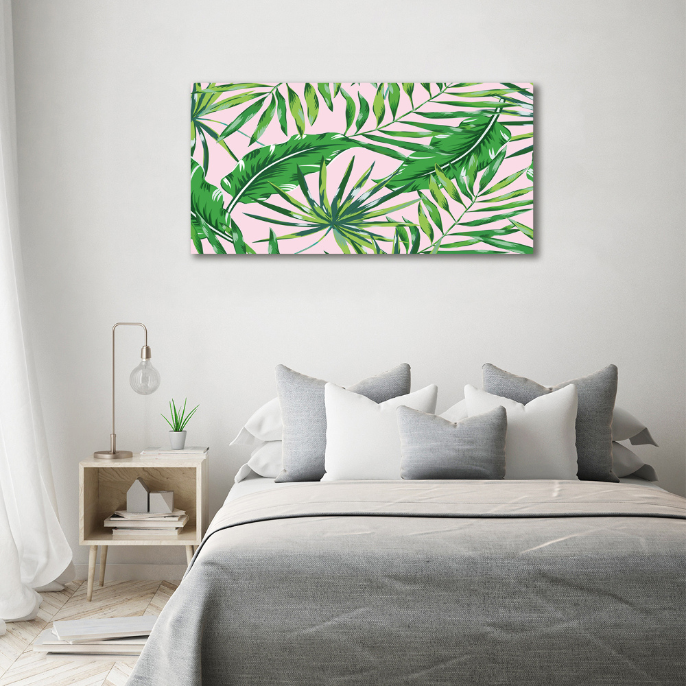 Tableau sur toile Feuilles tropicales fond rose