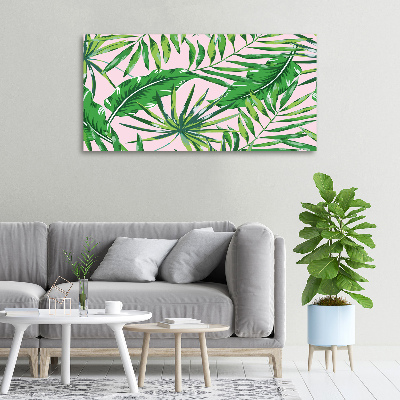 Tableau sur toile Feuilles tropicales fond rose