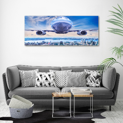 Tableau sur toile Avion au-dessus de la ville