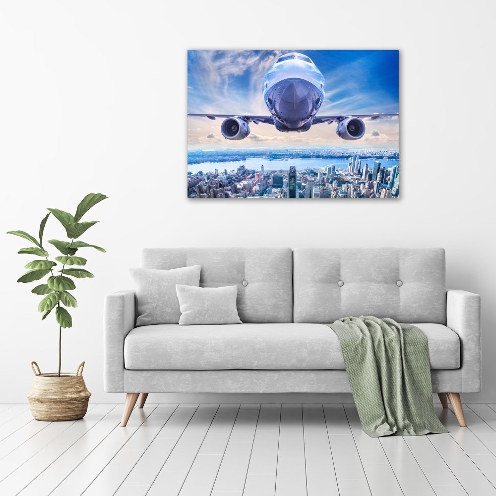 Tableau sur toile Avion au-dessus de la ville