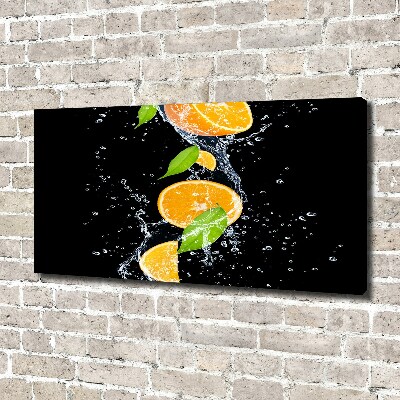 Tableau sur toile Oranges et eau