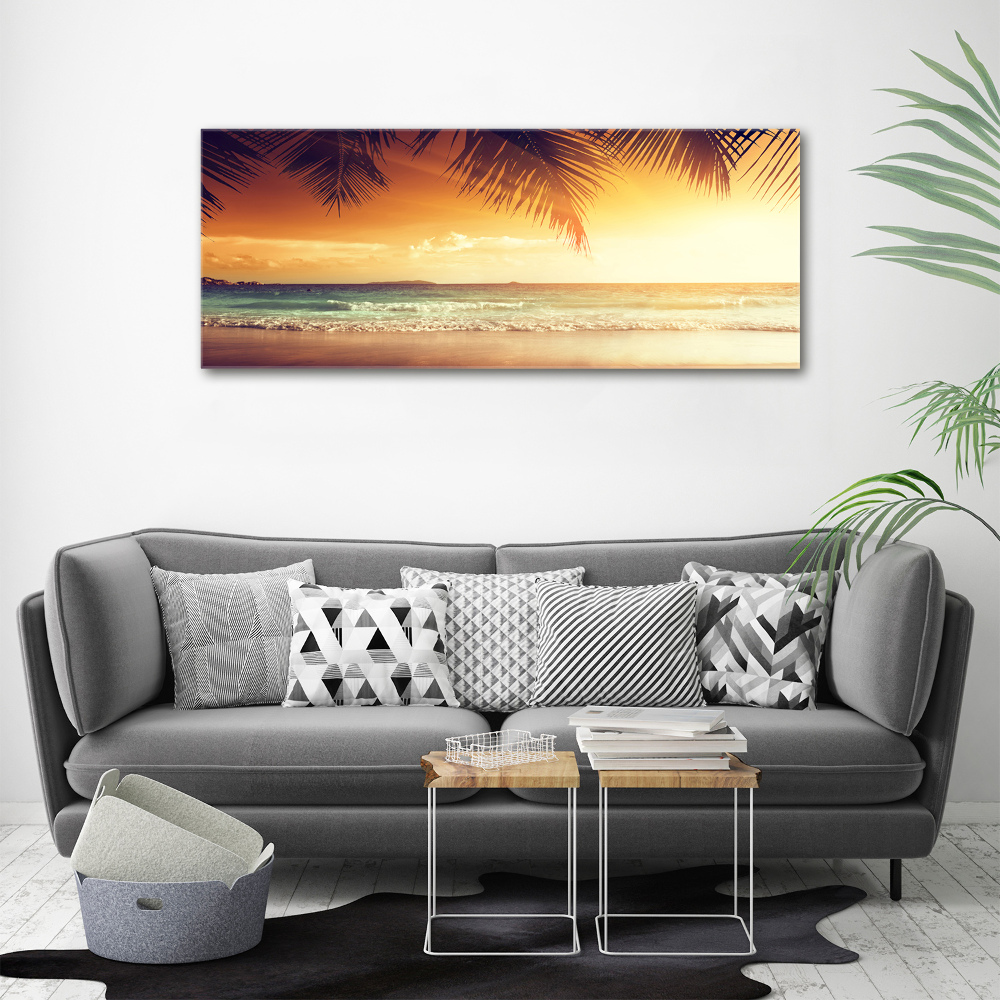 Tableau photo sur toile Plage tropicale feuilles de palmier