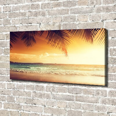 Tableau photo sur toile Plage tropicale feuilles de palmier