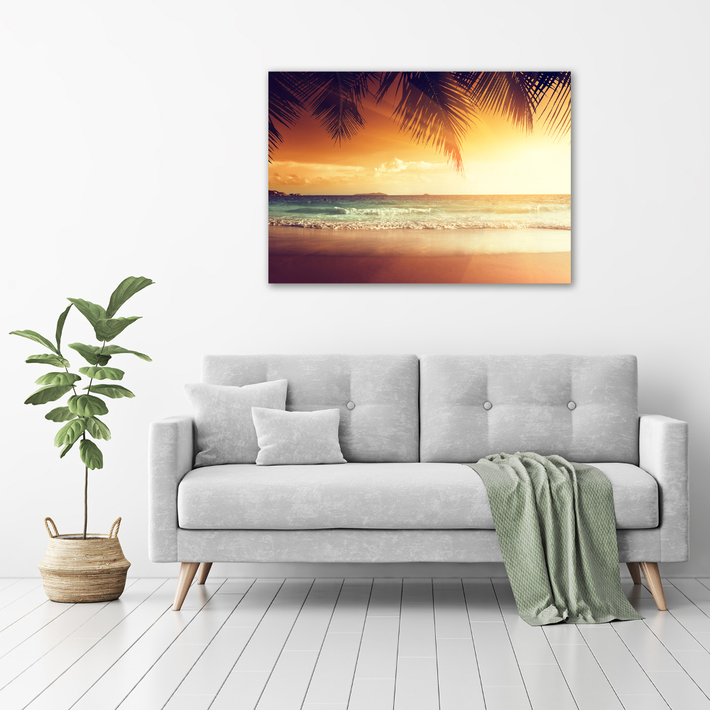 Tableau photo sur toile Plage tropicale feuilles de palmier