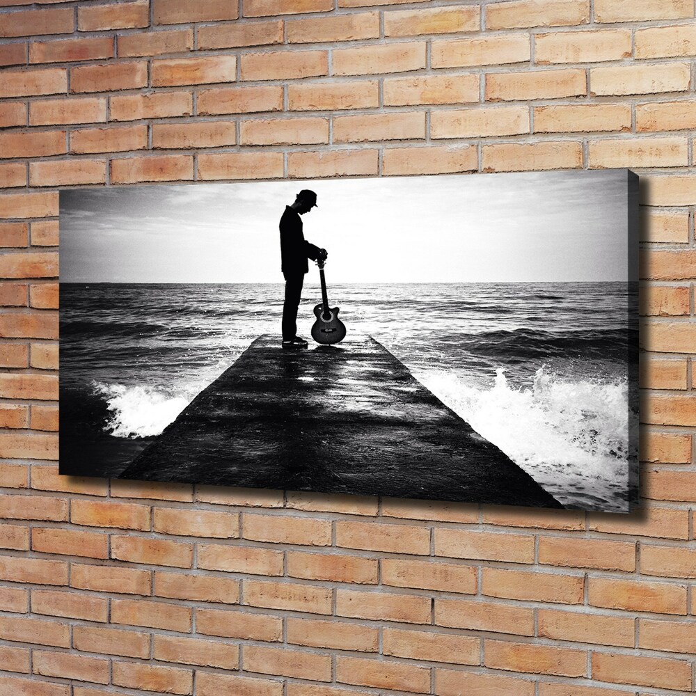 Tableau photo sur toile Guitariste sur une jetée