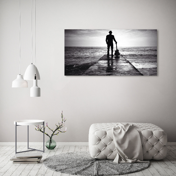 Tableau mural sur toile Guitariste sur une jetée
