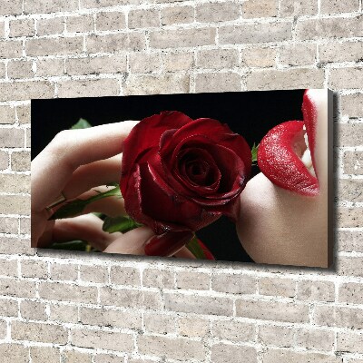 Tableau photo sur toile Femme avec une rose